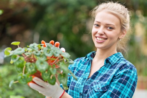 Gardener preparing a UK garden service booking